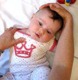 demonstrating stretching the neck
