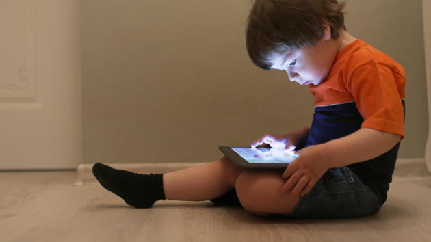 Child with iPad