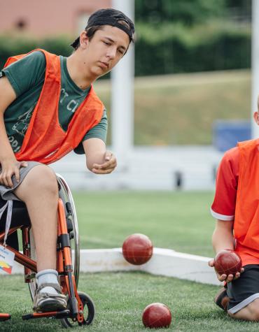 boys playing boccia