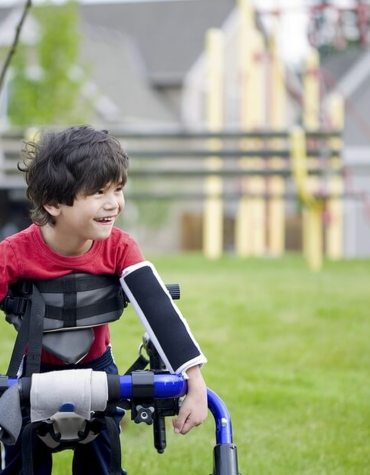 Boy with walking aids