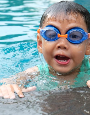 young child in pool