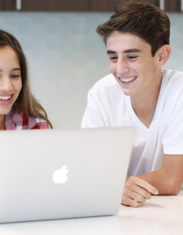 boy and girl on laptop