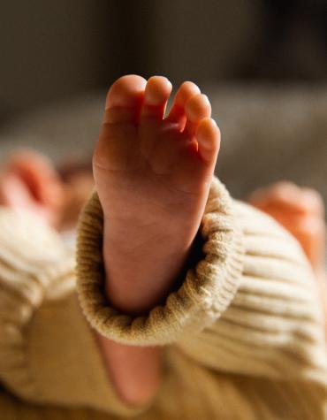 Babies feet in crib