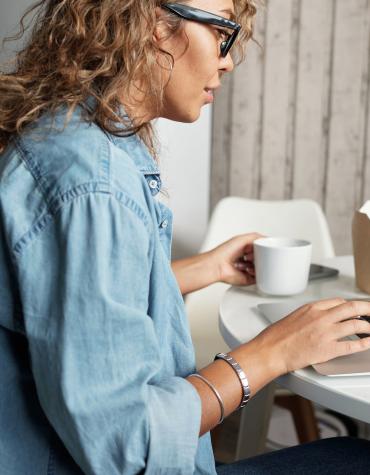 Adult on a video call using a computer