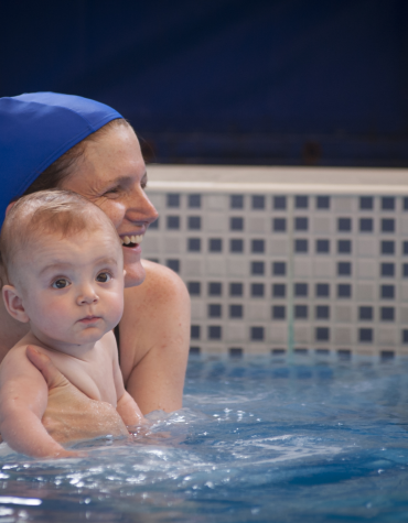mom and baby in pool