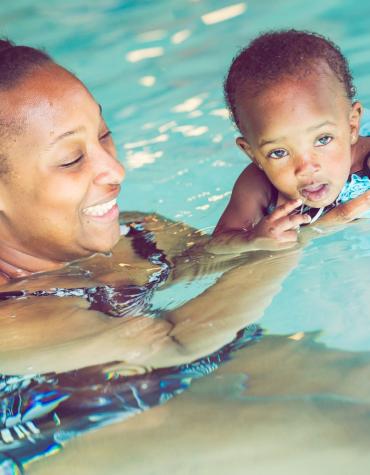 mom and child in pool