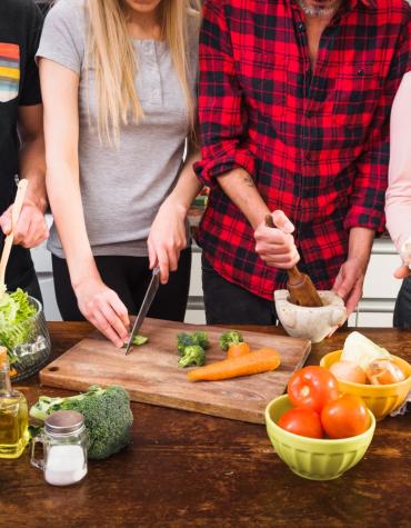 group of teens cooking