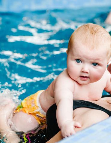 mom and baby in pool