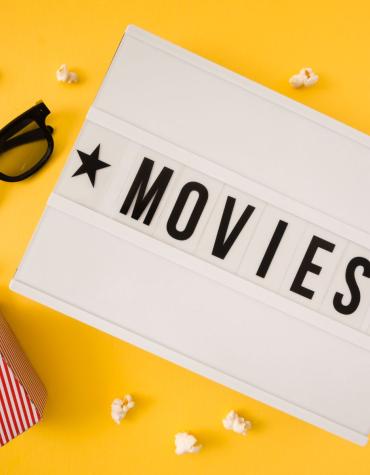 movie sign and popcorn