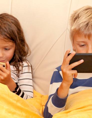 kids playing on phones