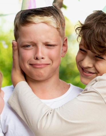 3 boys at a birthday party