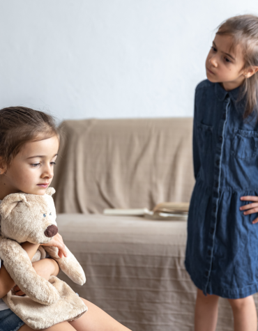 two girls interacting