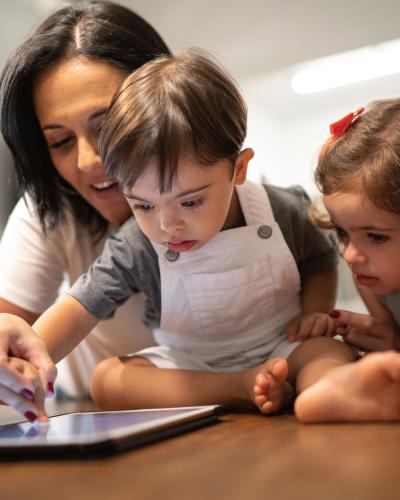 young boy with ipad